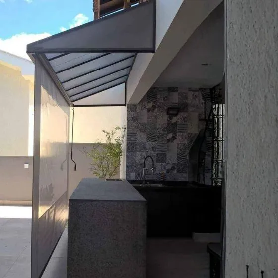 Reforma de Toldos e Coberturas em Suzano SP — Instalação em fachada comercial