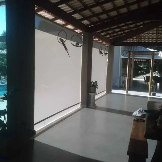 Toldo Cortina de Tela Screen em Suzano SP Toldo Cortina de Tela Screen em Suzano SP — Cobertura em passagem coberta entre ambientes