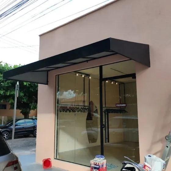 Toldo Fixo de Lona PVC em Suzano SP Toldo Fixo de Lona PVC em Suzano SP — Instalação em área gourmet com churrasqueira